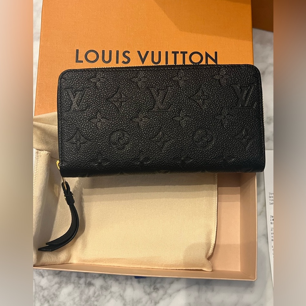 Louis Vuitton Monogram Empreinte Leather wallet for sale. - Picture 1 of 4